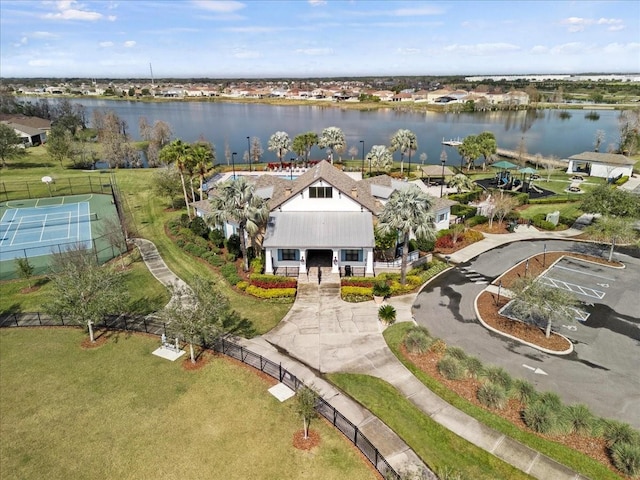 birds eye view of property featuring a water view