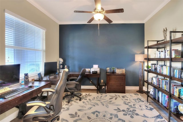 office with crown molding and ceiling fan