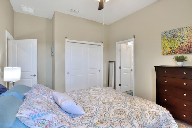 bedroom featuring ceiling fan and a closet