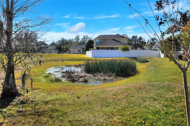 view of yard featuring a water view