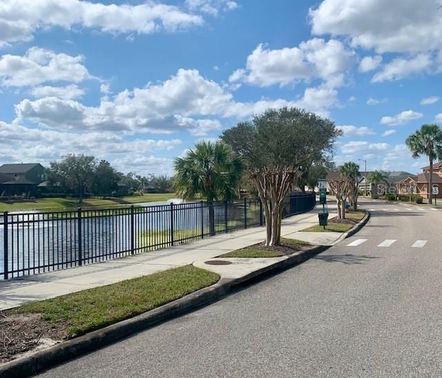 view of street featuring a water view