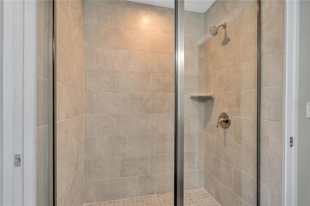 bathroom featuring an enclosed shower