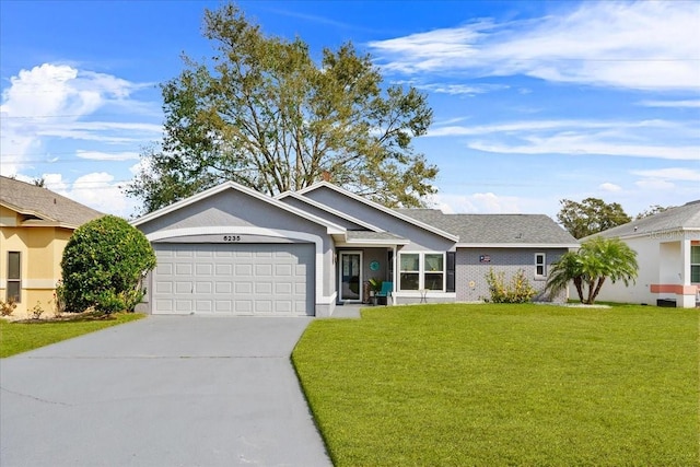 ranch-style home with a garage and a front lawn