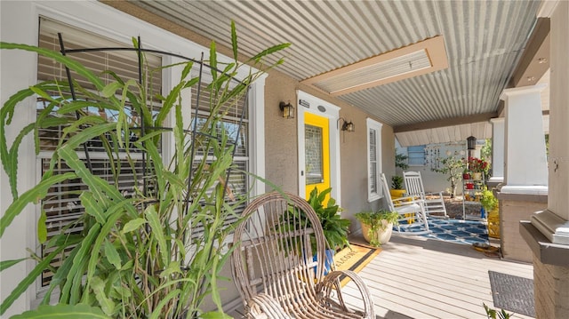 wooden deck featuring covered porch