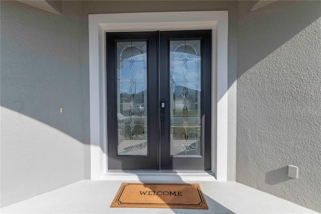 property entrance with french doors