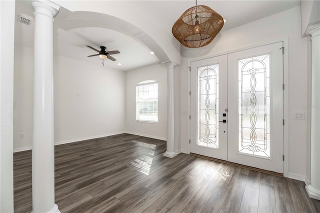 entryway featuring dark hardwood / wood-style flooring, french doors, ceiling fan, and ornate columns