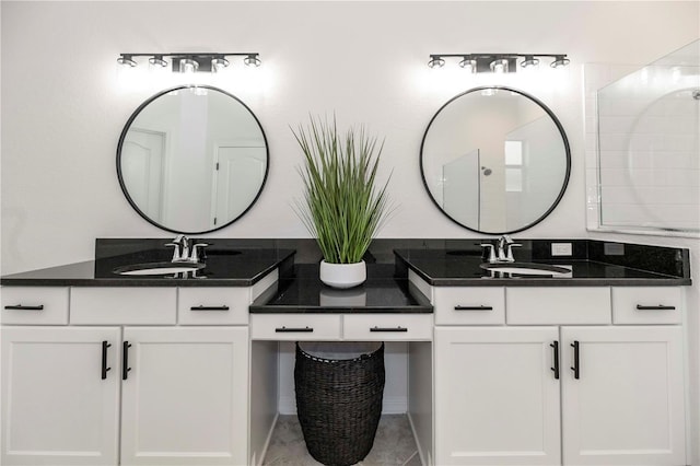 bathroom with vanity and walk in shower