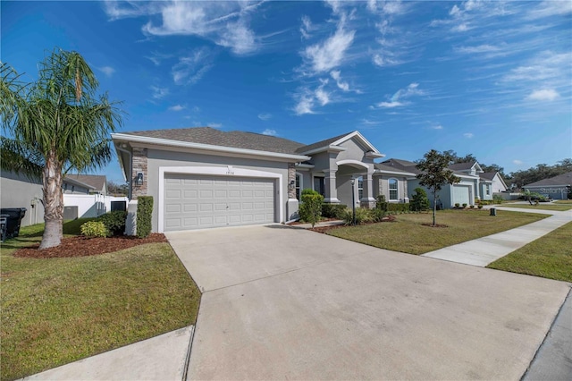 single story home with a garage and a front lawn