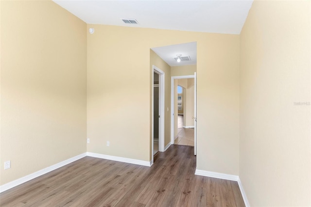 empty room with light wood-type flooring