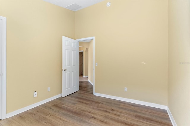 empty room with light wood-type flooring