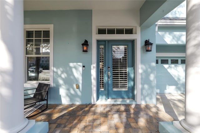 property entrance featuring a garage