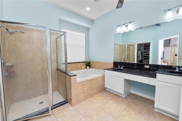 bathroom featuring vanity, ceiling fan, tile patterned flooring, and separate shower and tub