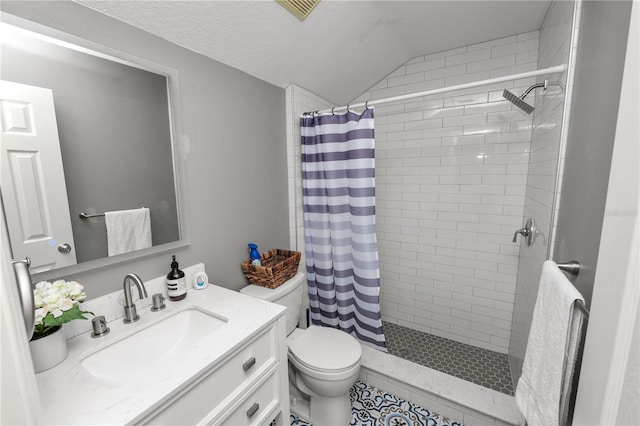 bathroom featuring lofted ceiling, a shower with shower curtain, vanity, a textured ceiling, and toilet