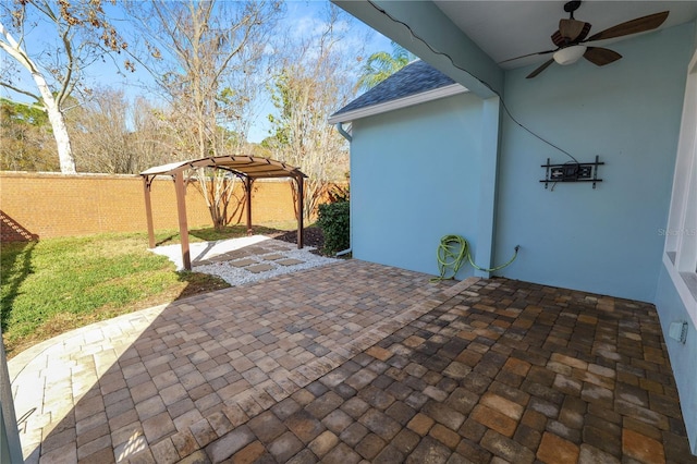 view of patio with a pergola and ceiling fan