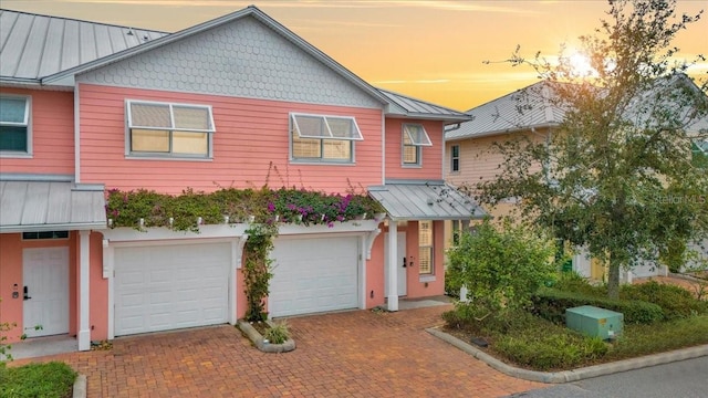 view of front of home with a garage