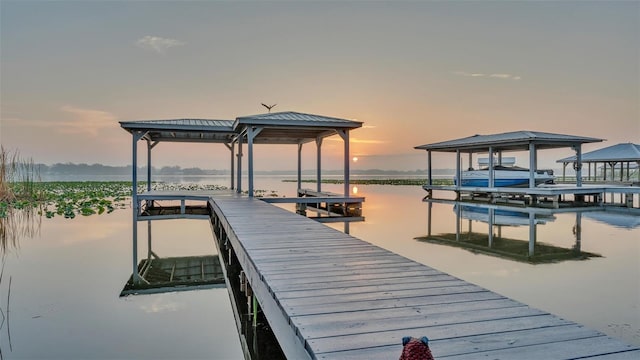 dock area featuring a water view