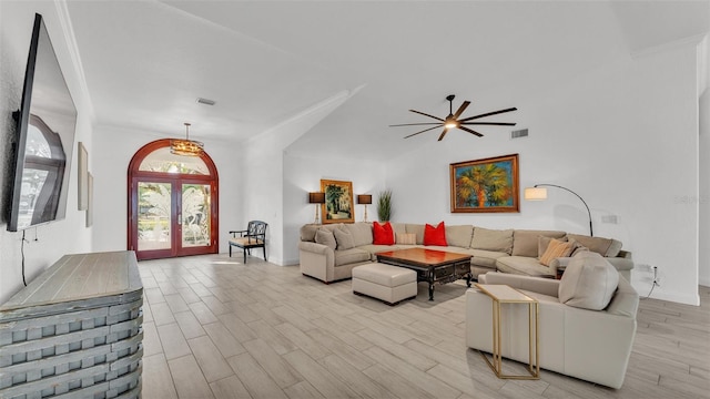 living room featuring french doors and light wood-type flooring