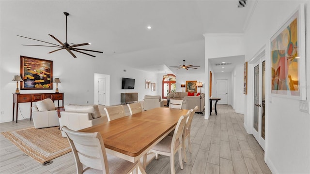 dining room featuring ceiling fan and light wood-type flooring