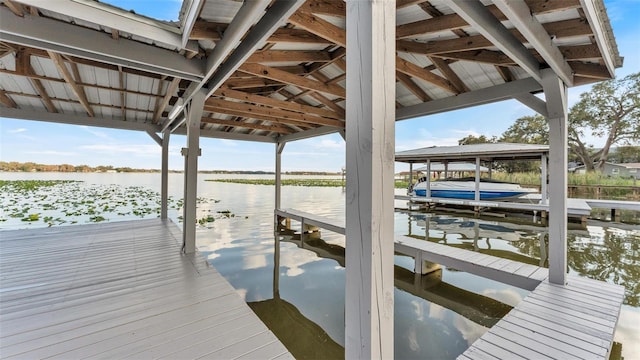 dock area with a water view