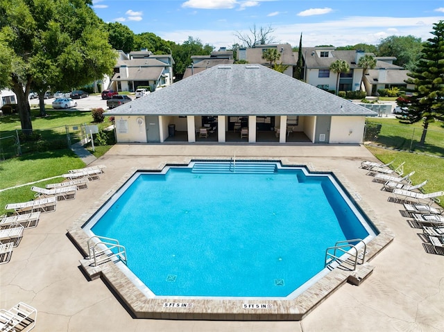 view of swimming pool featuring a patio area