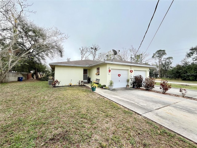 ranch-style house with a front yard and a garage