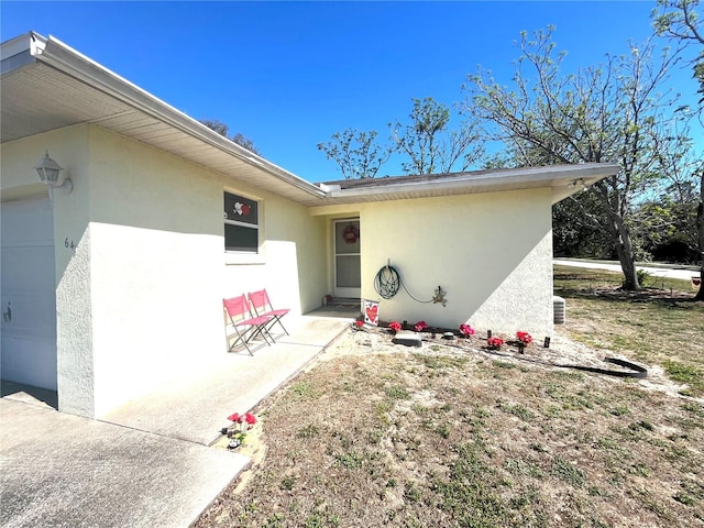 entrance to property featuring a garage