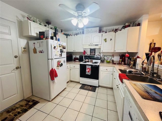 kitchen with white cabinets, light tile patterned flooring, white fridge, sink, and electric range oven