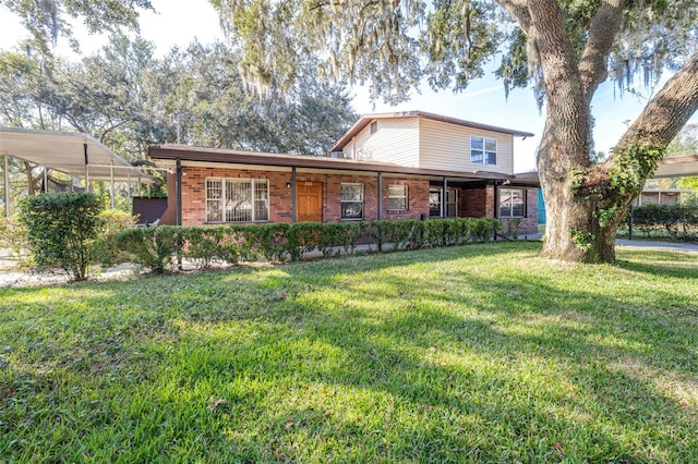 view of front of house with a front lawn