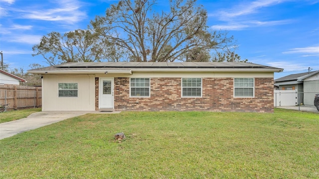 ranch-style house with a front lawn