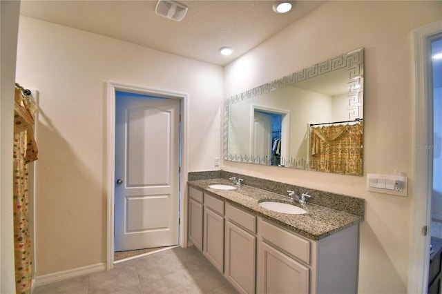 bathroom featuring vanity and tile patterned floors