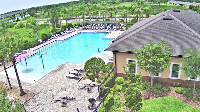 view of pool featuring a patio area