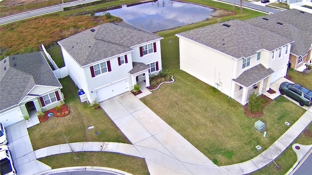 bird's eye view with a water view