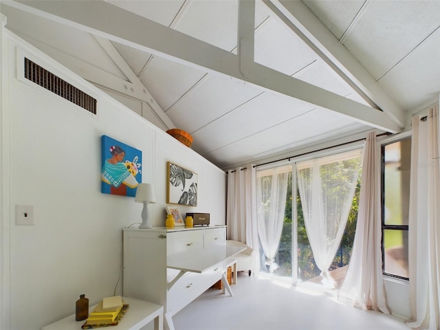 interior space with vaulted ceiling with beams