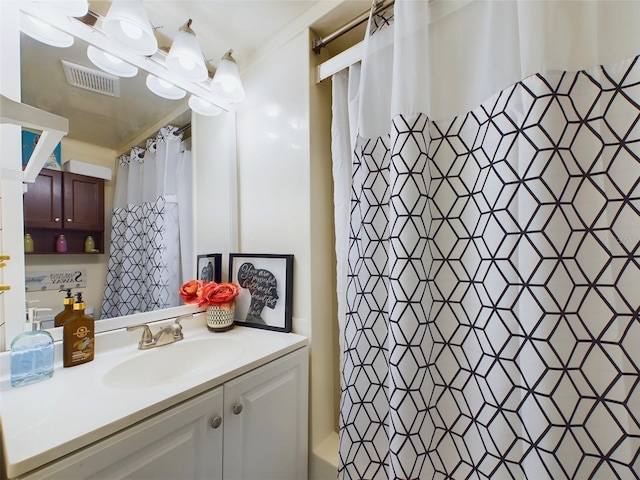 bathroom with vanity and a shower with curtain