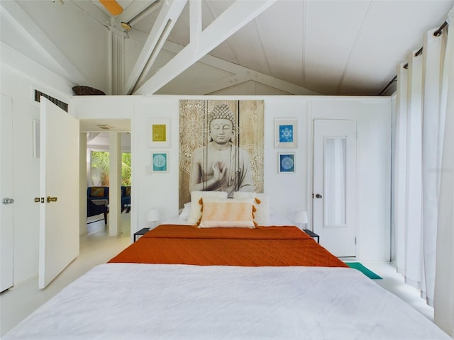 bedroom with lofted ceiling