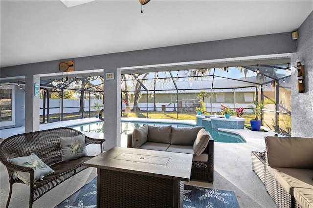 view of patio / terrace featuring outdoor lounge area, a pool with hot tub, and glass enclosure