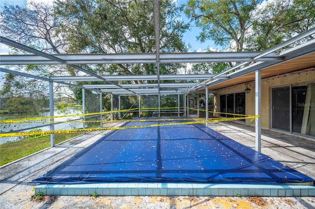 view of swimming pool with a patio area