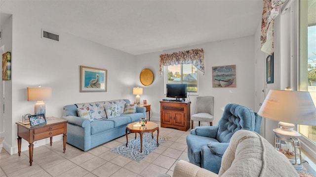 living room featuring light tile patterned flooring