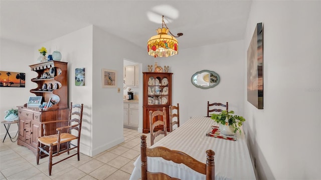 view of tiled dining space