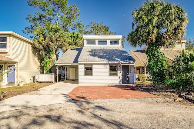 view of front of property with a carport