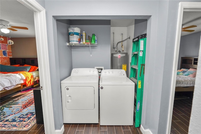 laundry room featuring ceiling fan, electric water heater, and washing machine and clothes dryer