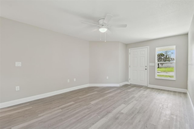 unfurnished room featuring ceiling fan and light hardwood / wood-style flooring