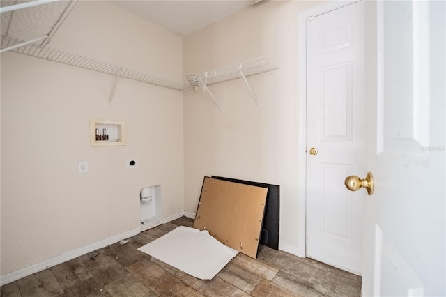 laundry area featuring wood finished floors, baseboards, hookup for an electric dryer, hookup for a washing machine, and laundry area