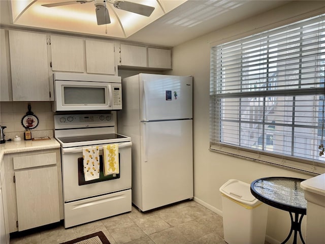 kitchen featuring light tile patterned floors, white appliances, decorative backsplash, and ceiling fan