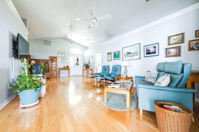 living room with ceiling fan, ornamental molding, high vaulted ceiling, and light wood-type flooring