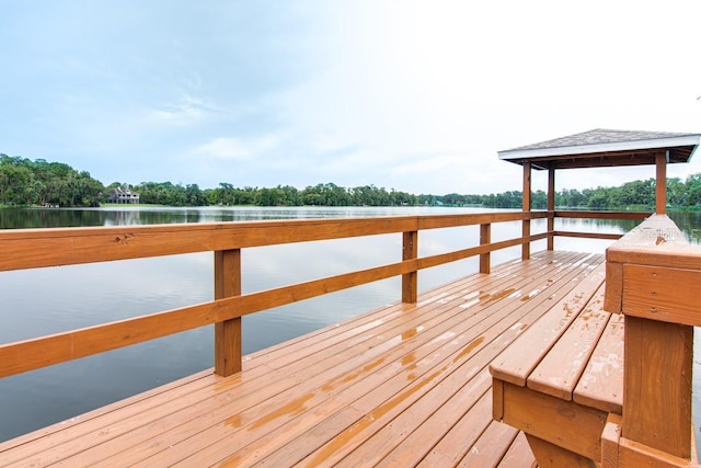 dock area featuring a gazebo and a water view