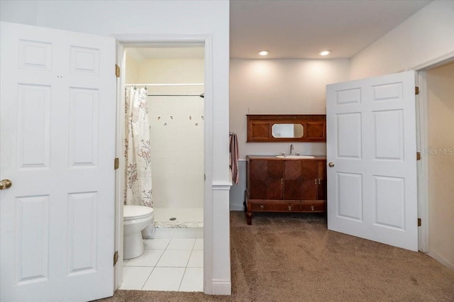 full bath featuring recessed lighting, toilet, a shower stall, vanity, and tile patterned flooring