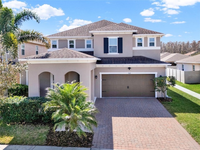 3460 Canvas St, Kissimmee, FL 34741 - view of front facade featuring a garage