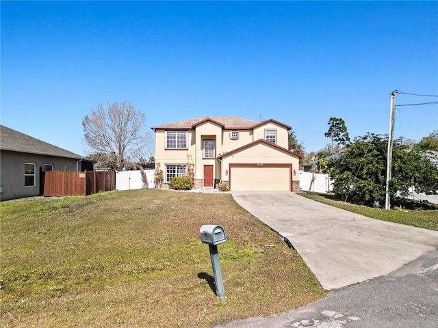 view of front of house featuring a garage and a front yard