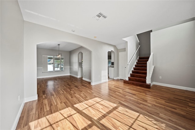 unfurnished living room with light hardwood / wood-style flooring